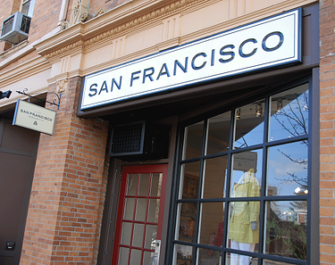 carved signs, painted signs, carved and painted signs