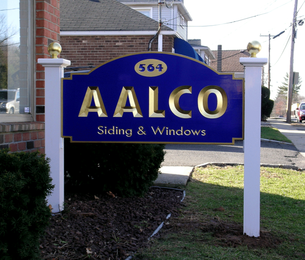 carved and gilded sign