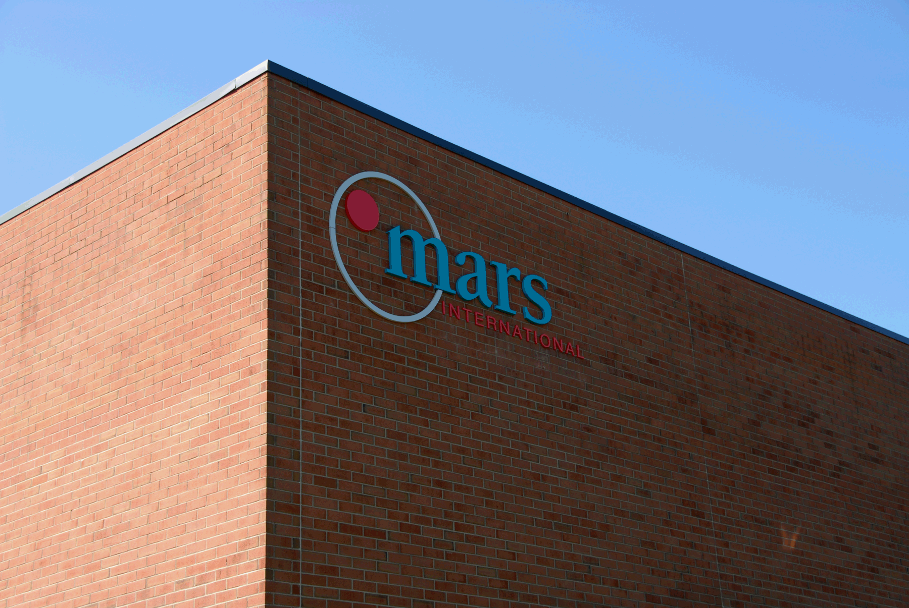 Mars International adds custom signage to their new headquarters in