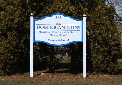 carved and painted signs